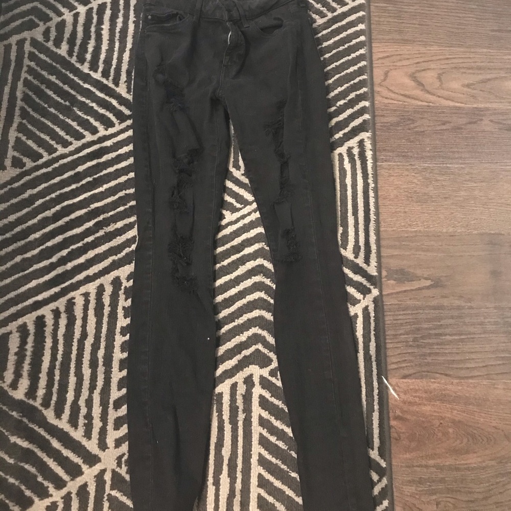 Black distressed skinny jeans